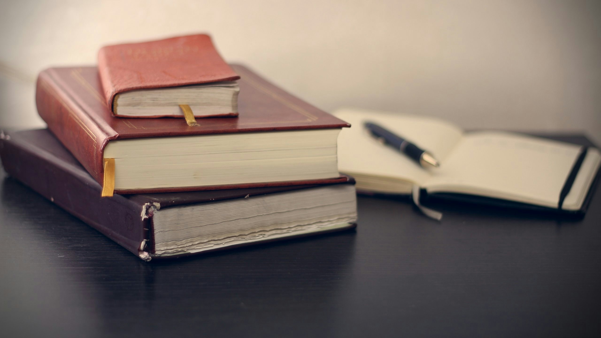 Legal books and open notebook on a professional desk