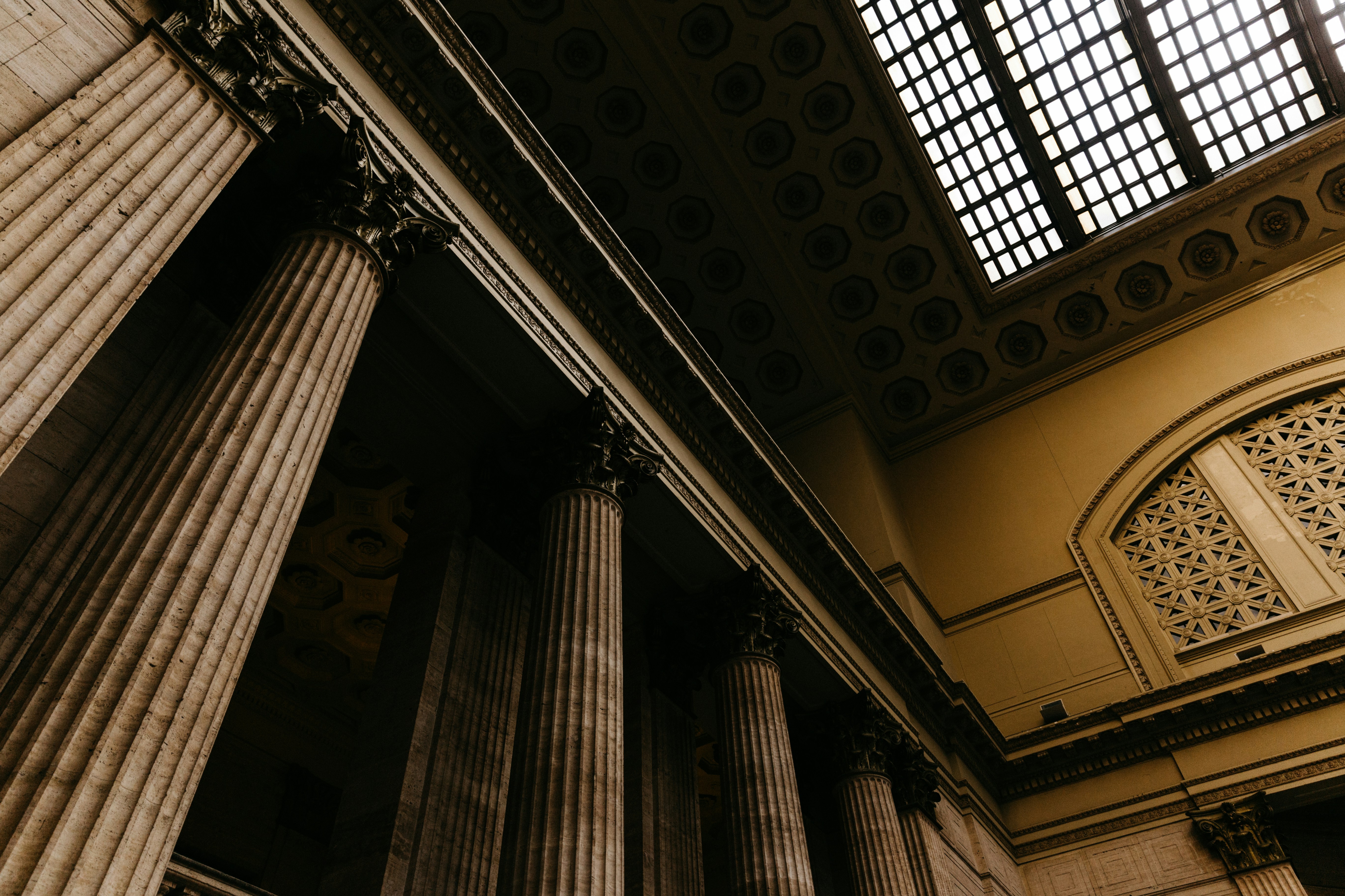 Grand classical courthouse columns and coffered ceiling